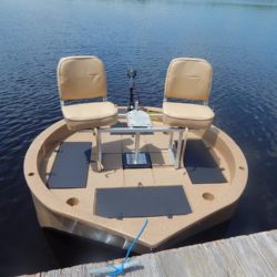 This is a wide shot of the two seat conversion kit on the round boat while tied at the dock.