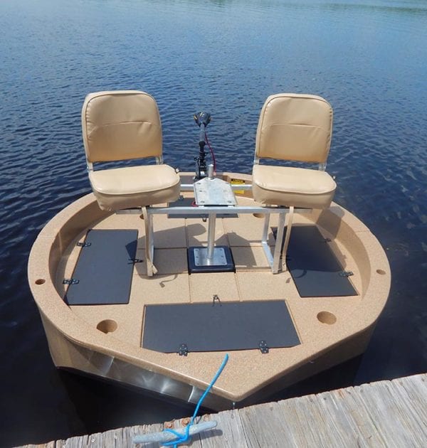 This is a wide shot of the two seat conversion kit on the round boat while tied at the dock.